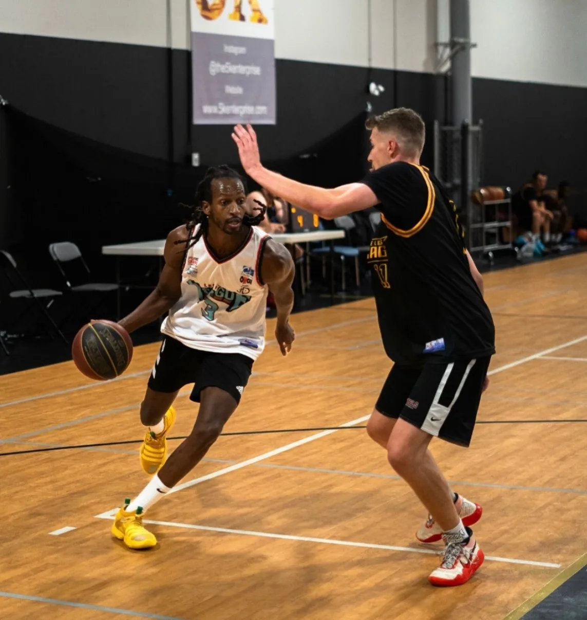 ROHO Warriors player driving past a defender at Legacy Athletics