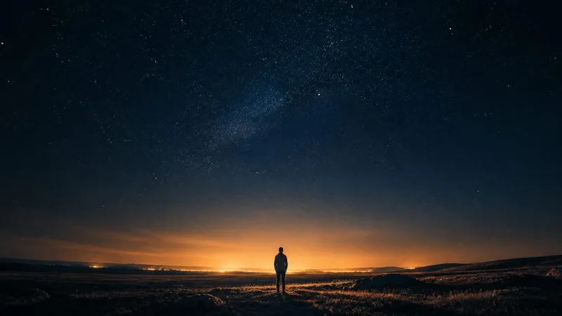 Why Me? &mdash; a lone figure under a vast starry sky
