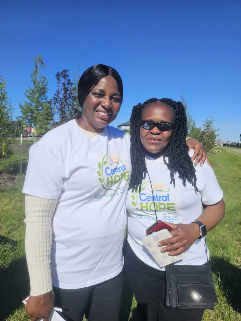 Two women volunteering together during the Central Hope Food Drive